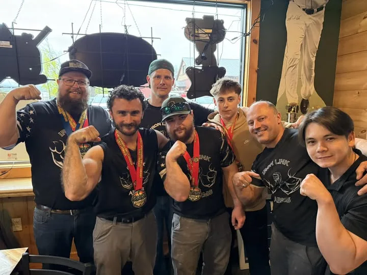 Iron Link Arms members posing together